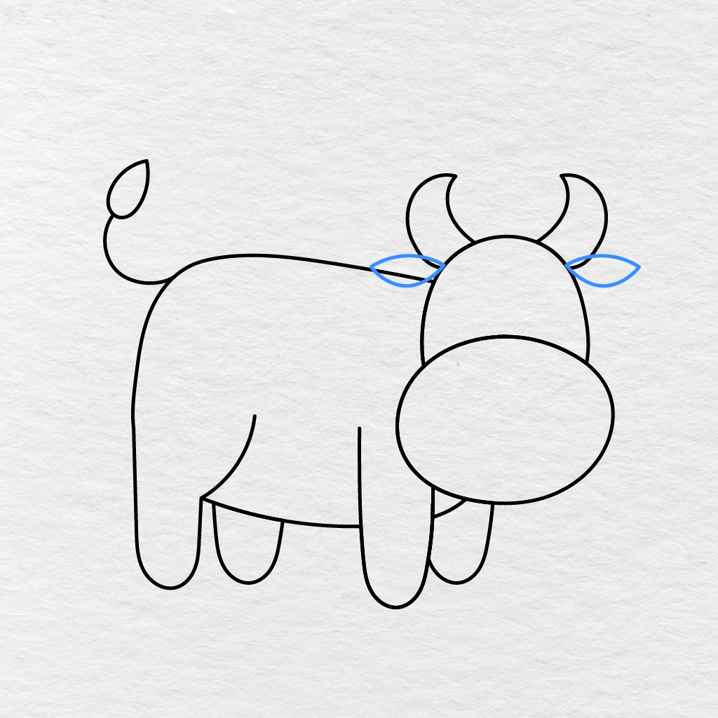 Step 8 Showing Two Leaf Shaped Ears Added Below The Cow's Horns.